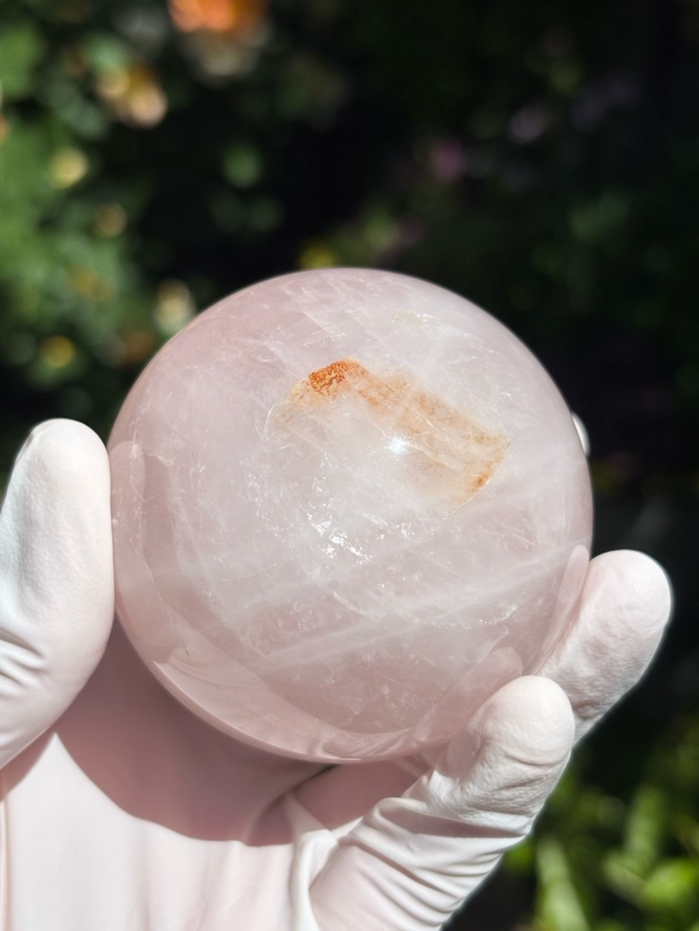Rose Quartz Crystal Sphere with Small Rainbows and Hematoid Quartz Inclusion